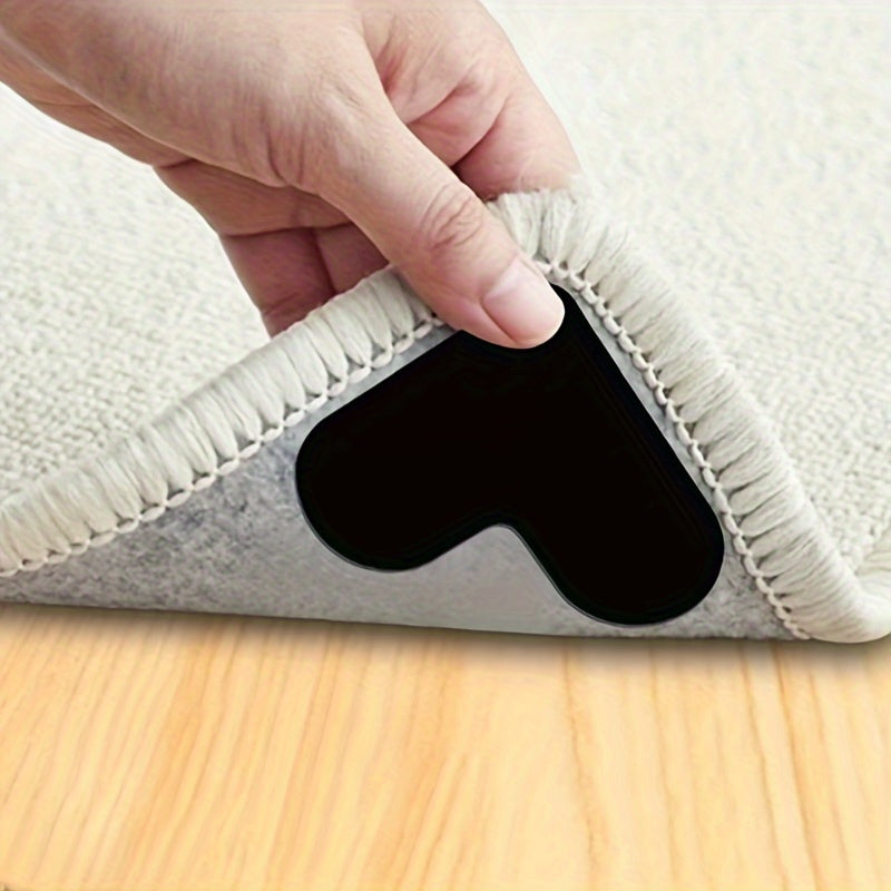 Juego de 4 agarradores de alfombra antideslizantes en forma de corazón para suelos de madera negra