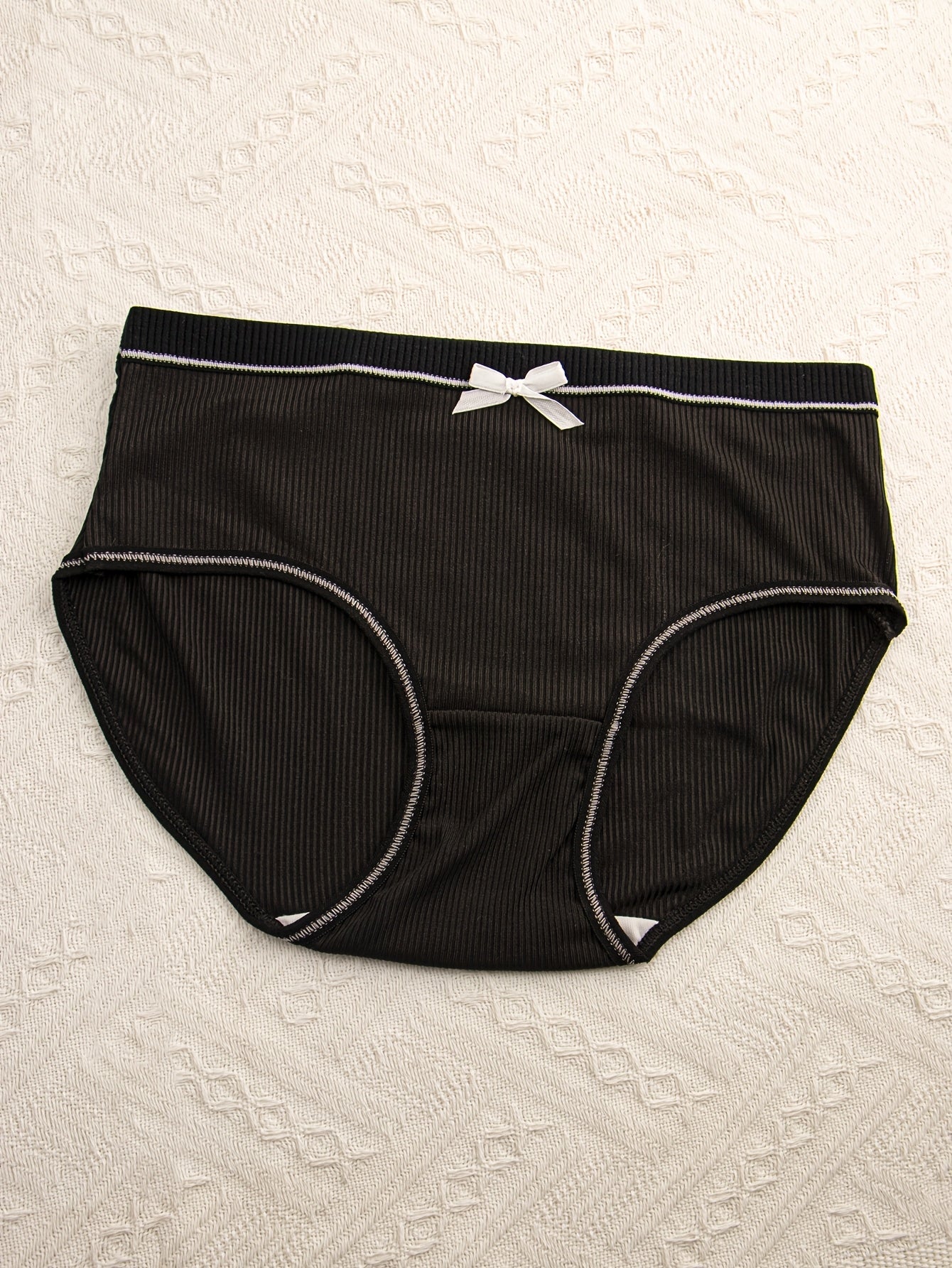 Pack de 4 braguitas de punto transpirable con ribete y diseño de triángulo para mujer