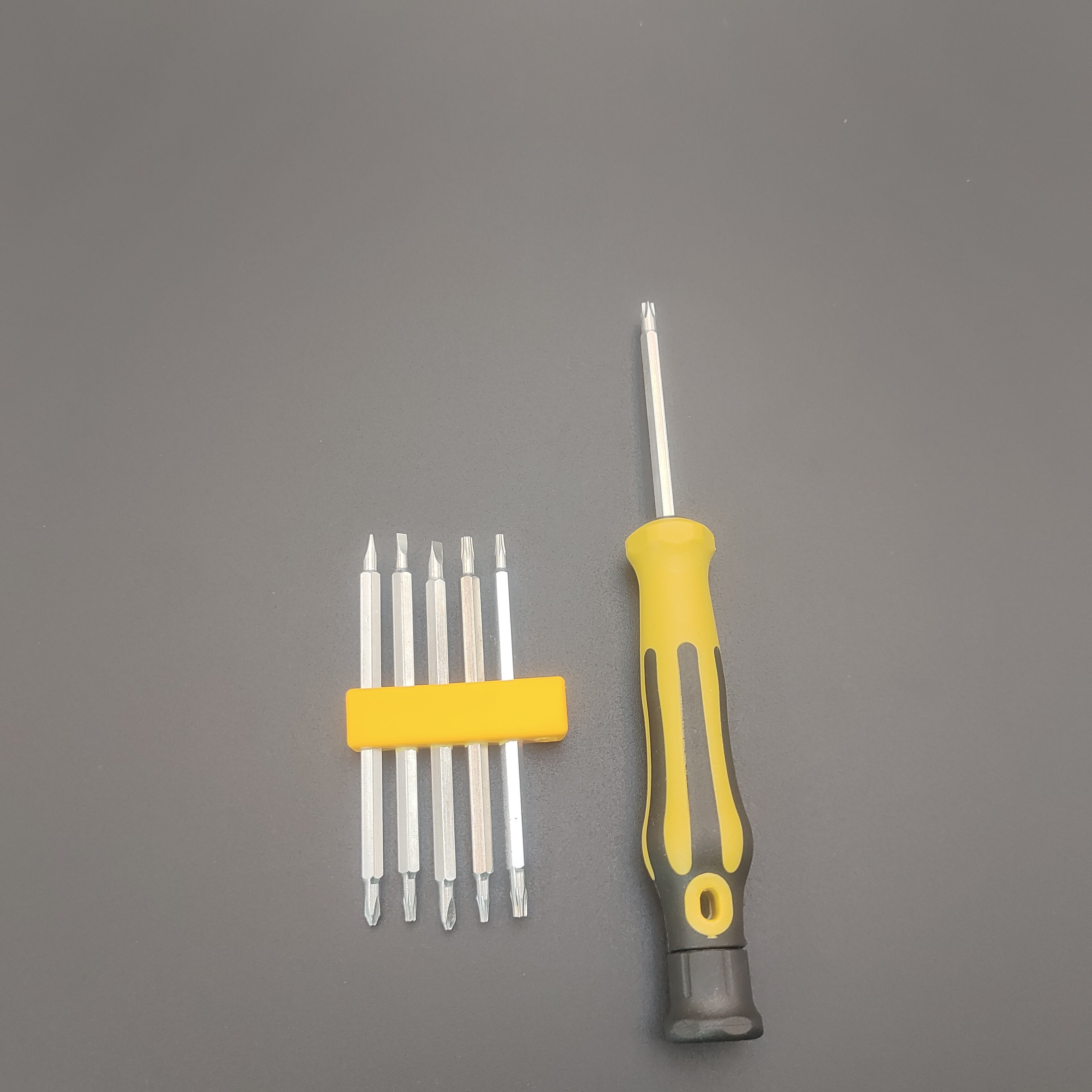 Juego de destornilladores de precisión de acero al carbono 12-en-1 para teléfonos y tablets