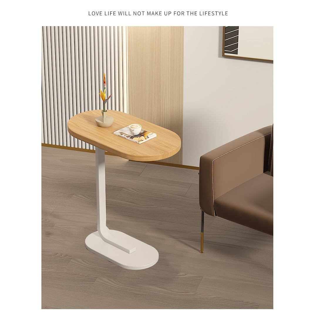 Zaytun yog'ochi va temirdan yasalgan zamonaviy C-shaklidagi divan yon stoli, mustahkam qora ramkaga ega. Turli joylar uchun mos, ixcham va bardoshli dizayn.