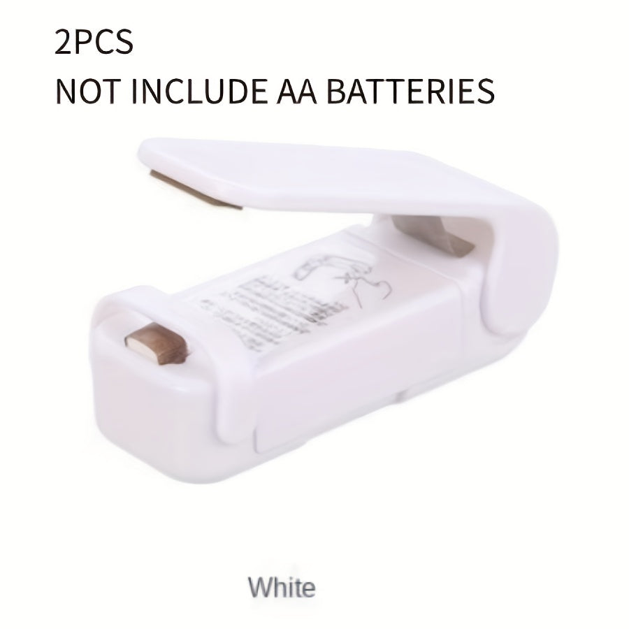 Plastik paketlar uchun portativ mini yopishtiruvchi mashina, atıştırmalık paketlash uchun ideal. Oq, qo'lda, batareyali. Batareyalar kiritilmagan.