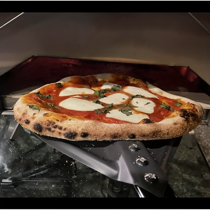 Этот алюминиевый лопата для пиццы длиной 8 дюймов и имеет нескользящую ручку для удобного использования. Ручка съемная, длиной 80,01 см, что делает ее идеальной для домашних пицц и хлеба.