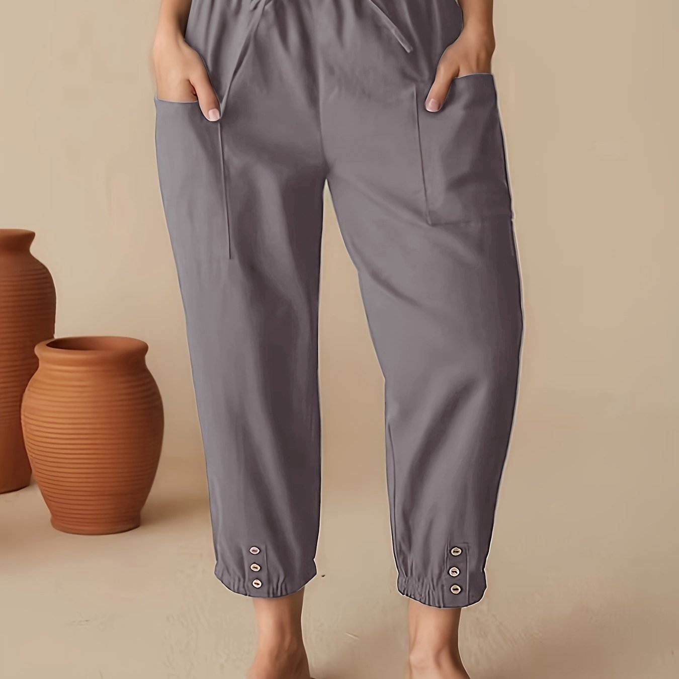 Pantalones casual de cintura alta y corte cropped para mujer con bolsillos azul marino