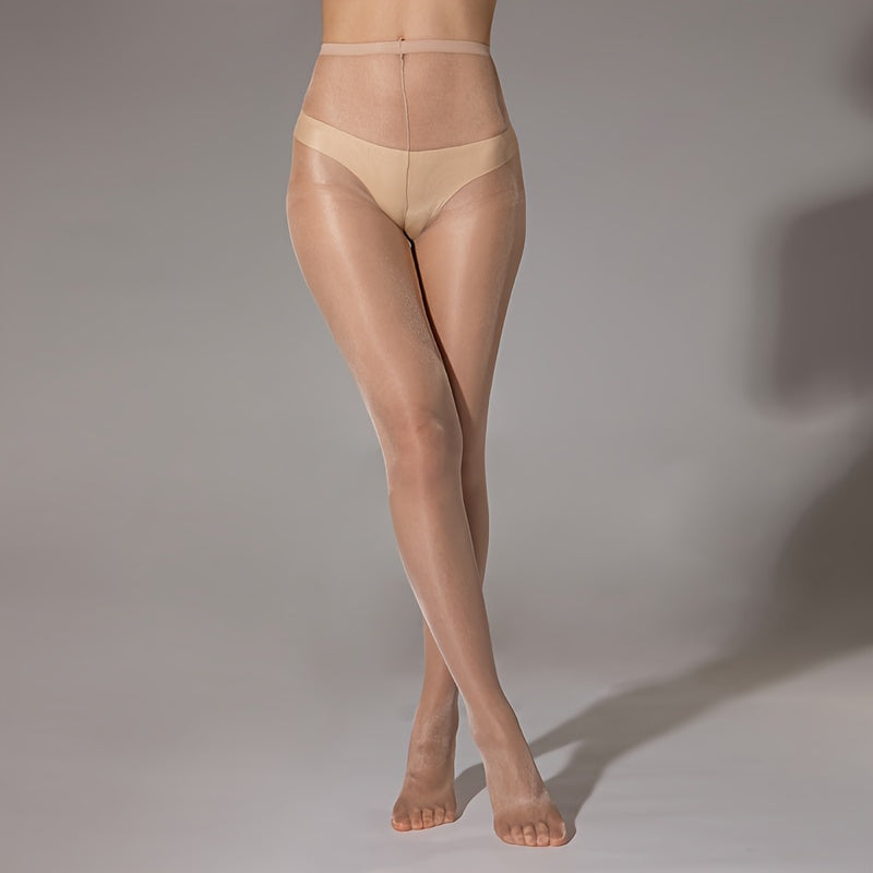 Женские сексуальные колготки с блестящим перламутровым и светящимся серебристым финишем на основе конского масла.