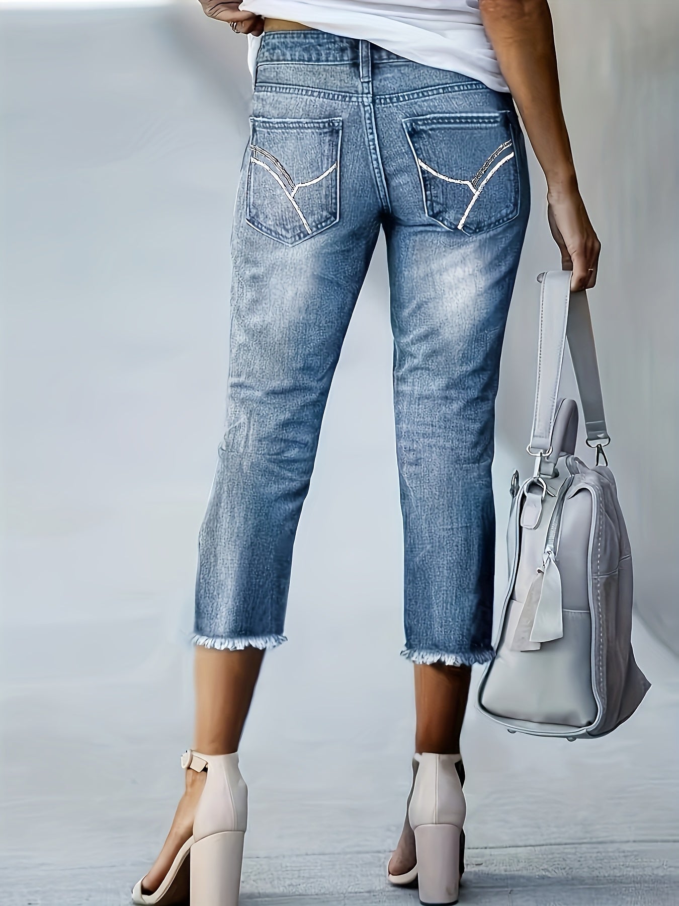 Pantalones ajustados de mujer de talla grande con bordado y borde crudo