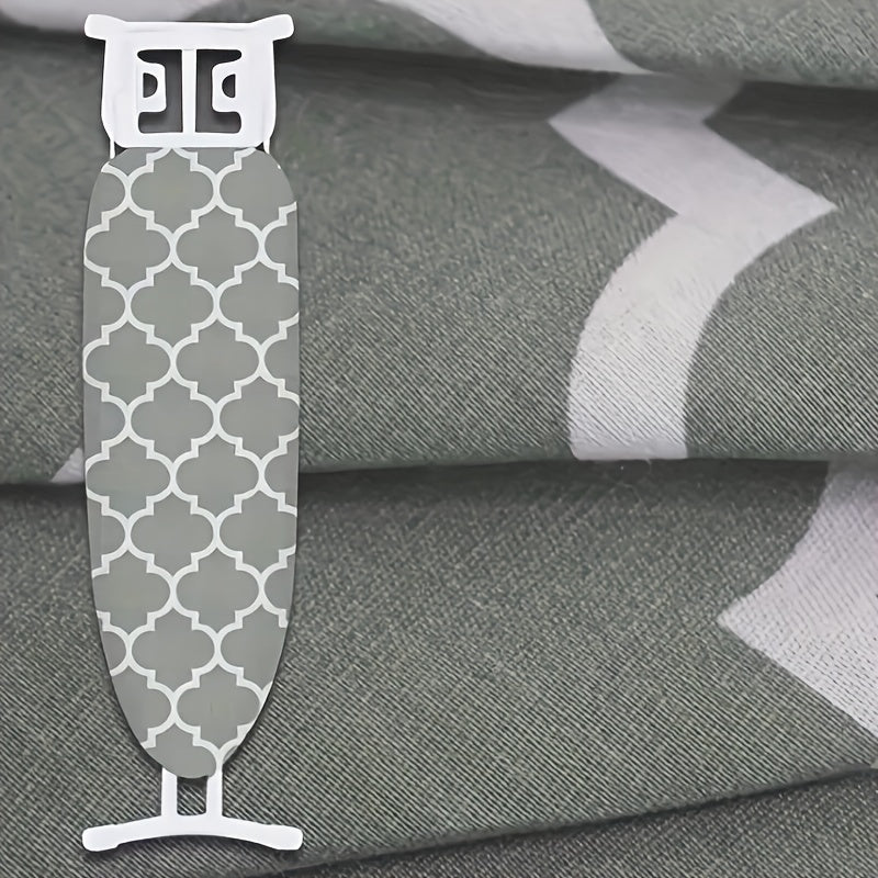 1 чехол для гладильной доски из 100% хлопка с серым волнистым узором. Этот чехол термостойкий, прочный и многоразовый, а также водонепроницаемый. Он предназначен для гладильной доски размером 15*54 дюйма для использования на домашней кухне. Этот модный и
