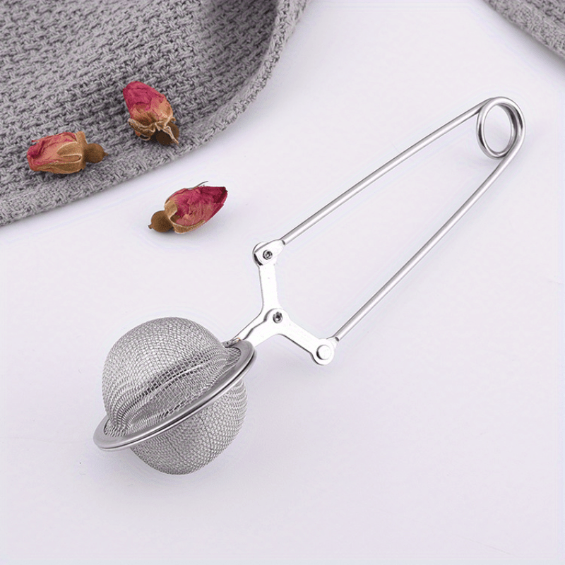 Choy sevuvchilar endi Press-to-press tutqich bilan Stainless Steel Tea Infuser qulayligini bahramand bo'lishlari mumkin. Bu oddiy va amaliy metall choy filtri uyda choyni suzish uchun ideal bo'lgan oshxona va ovqatlanish uchun zarur bo'lgan aksessuardir.