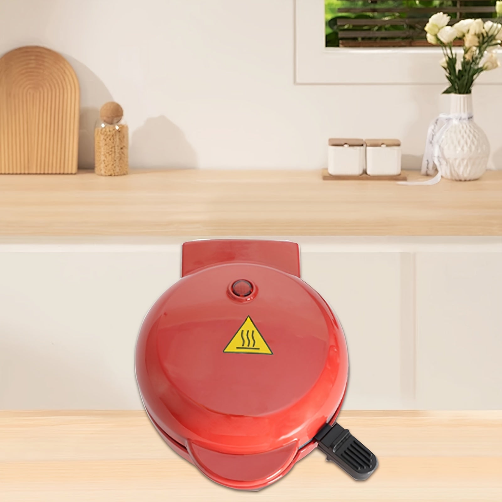 Small red electric kitchen breakfast machine for waffles and sandwiches