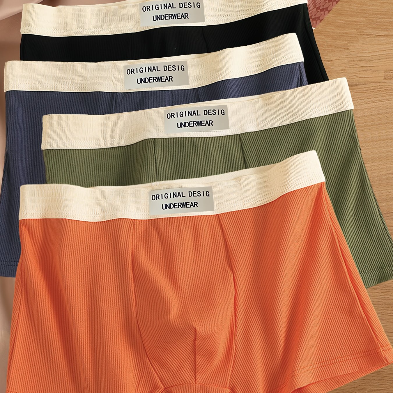 4-Pack Erkaklar uchun Boxer Briefs, 95% Polyester va 5% Spandexdan tayyorlangan, o'rtacha cho'ziluvchan trikotaj mato, bir rangli qisqa ichki kiyim, tasodifiy sport trunks, engil va qulay moslik.
