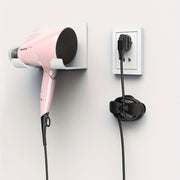 Ova shaklidagi plastik sim tutqich, oshxona texnikasi kabellarini tartibga solish uchun sovun idishi bilan