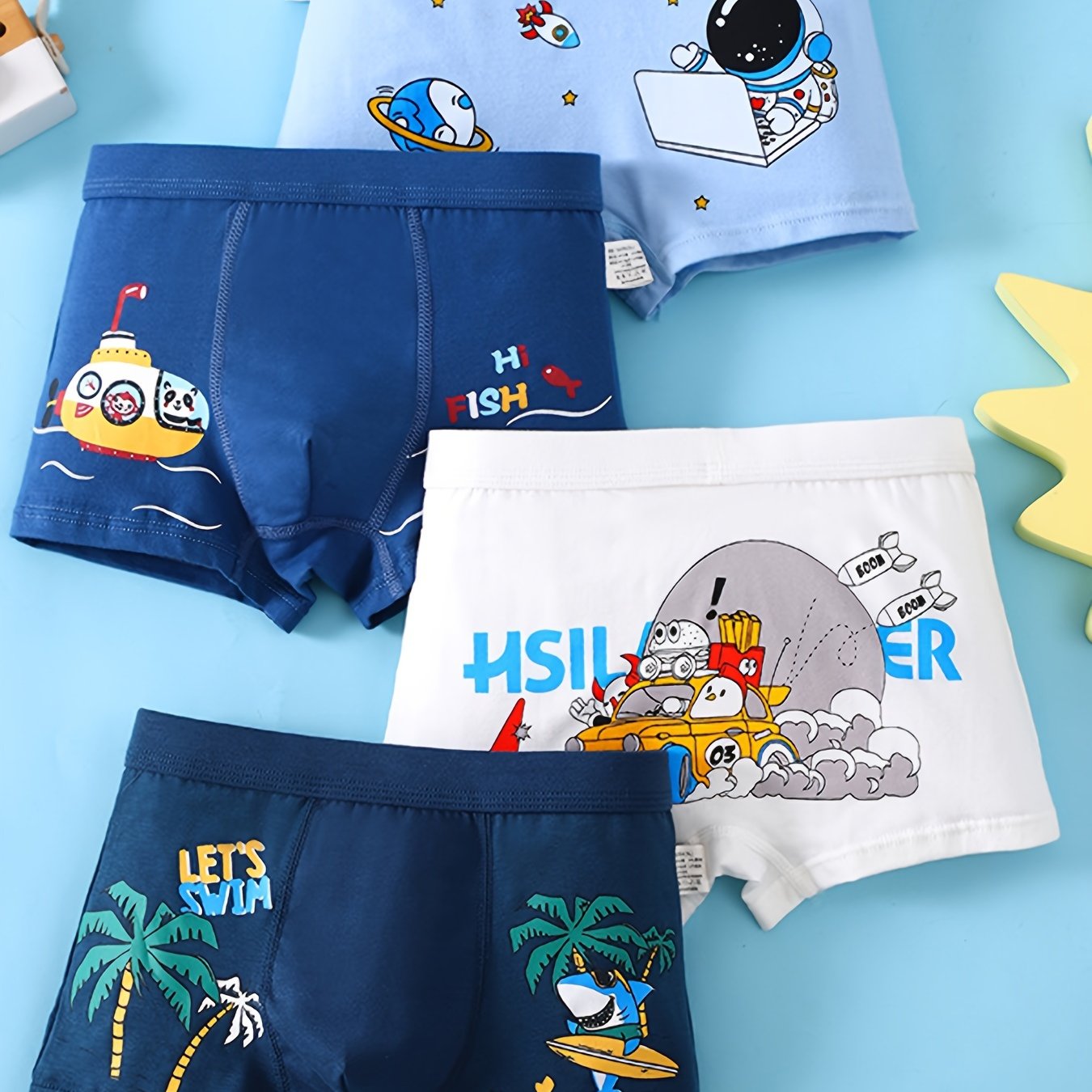 Conjunto de 4 calzoncillos bóxer de algodón para niños con estampados de astronauta y dinosaurio, transpirables, elásticos y aptos para todas las estaciones
