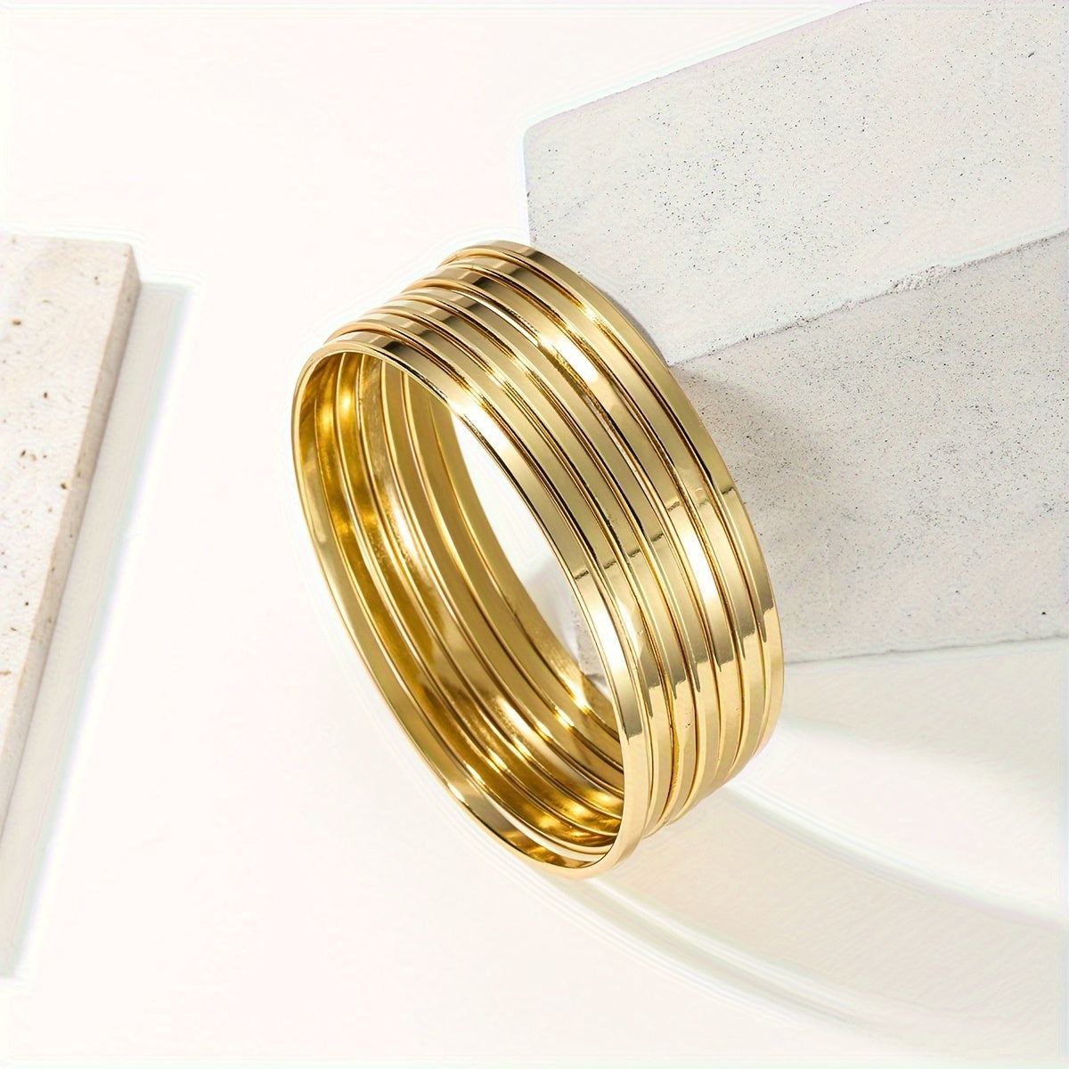 7-Piece Gold Plated Stainless Steel Bangles Set for Women Minimalist Multi-Layered Jewelry for Daily Wear or Parties