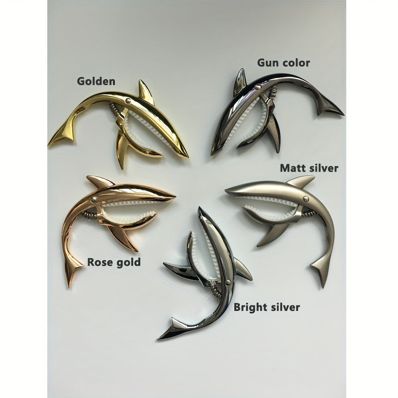 Akustik va elektr gitarlari uchun zamonaviy sink qotishma capo, tonni o'zgartiradi.