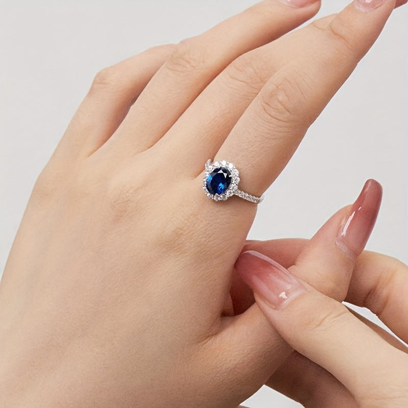 S925 sterling kumushdan yasalgan, dumaloq va oval geometrik kesilgan kubik zirkoniya toshlari bilan bezatilgan nozik gullar dizayni uzuk - kelinlar uchun ideal to'y sovg'asi, aprel tug'ilgan toshi, har kuni va maxsus tadbirlar uchun mos.