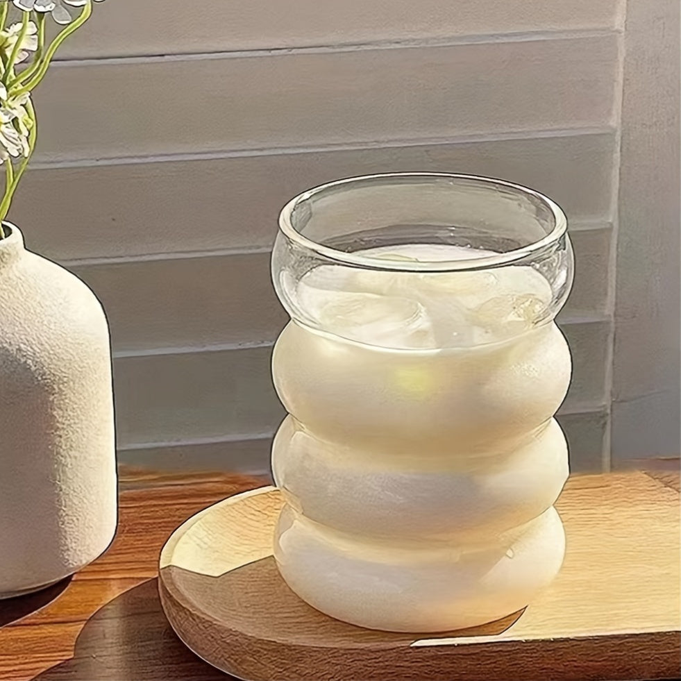 Premium borosilikat shishadan tayyorlangan izolyatsiyalangan Caterpillar kubog'i. Faqat qo'lda yuvish. Issiq va sovuq ichimliklar uchun mos. Ekologik toza va qayta ishlanadigan.