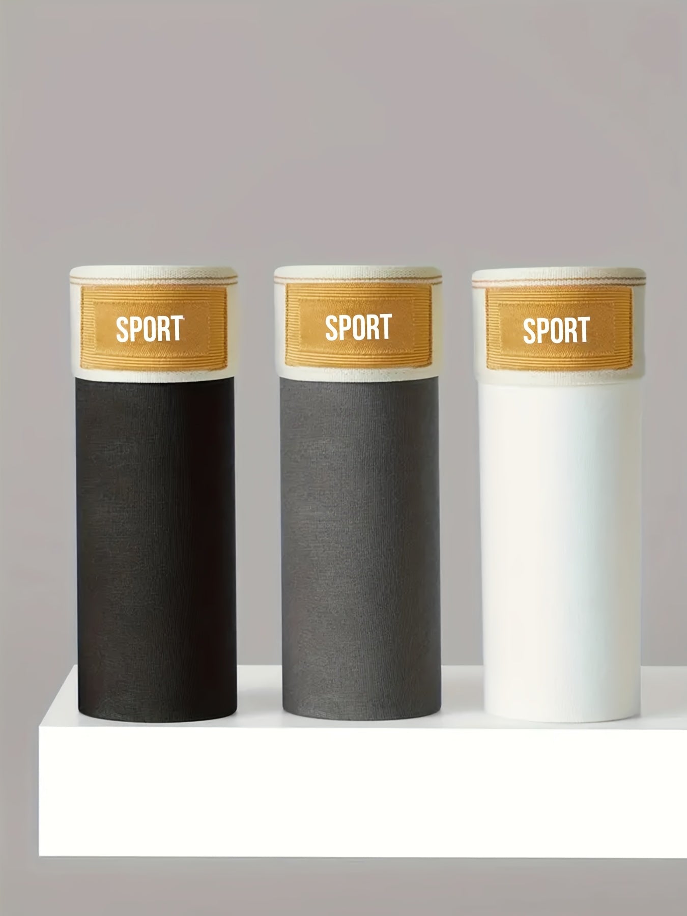 Erkaklar uchun nafas oladigan 3 ta polyester boxer short, sport va dam olish uchun o'rtacha cho'ziluvchan to'qima bilan.