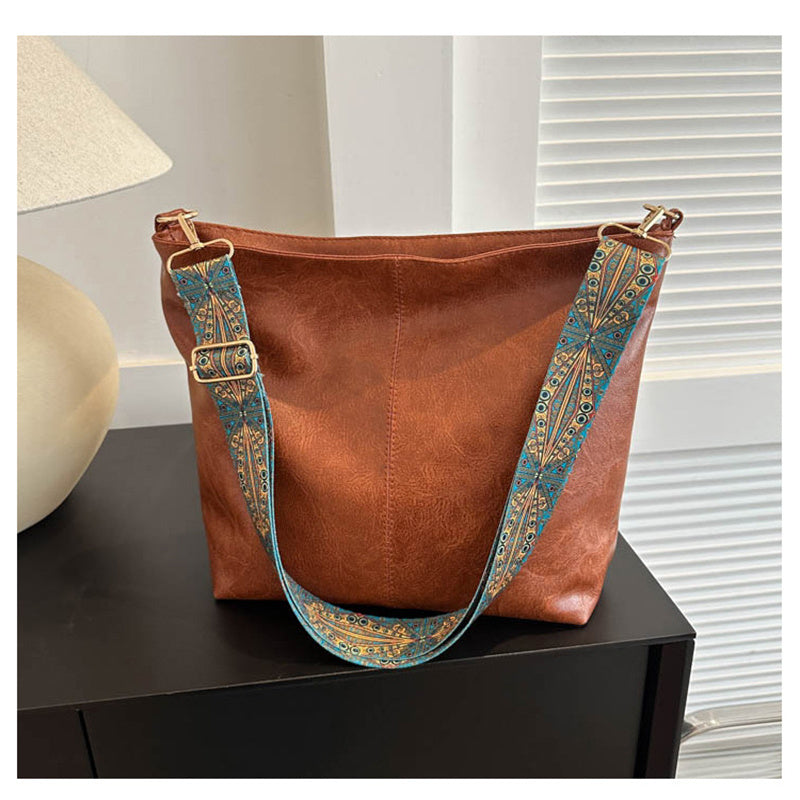 Yangi zamonaviy va nafis ayollar sumkasi, katta sig'imli, sozlanadigan yelka tasmalari, zip yopilishi, ajratiladigan tasmalari, naylon astari va khaki, yashil, jigarrang va qora ranglarda mavjud.