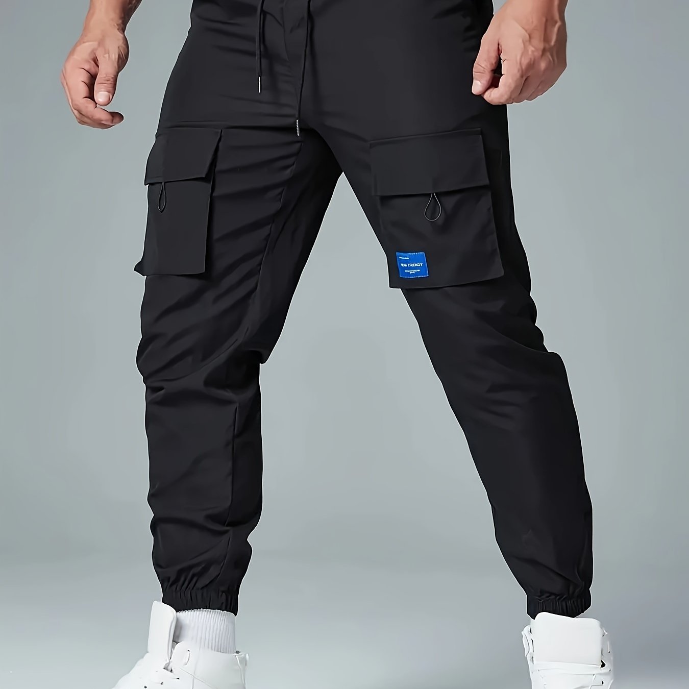 Men's Polyester Cargo Pants with Drawstring Waist and Multiple Pockets for Spring and Fall
