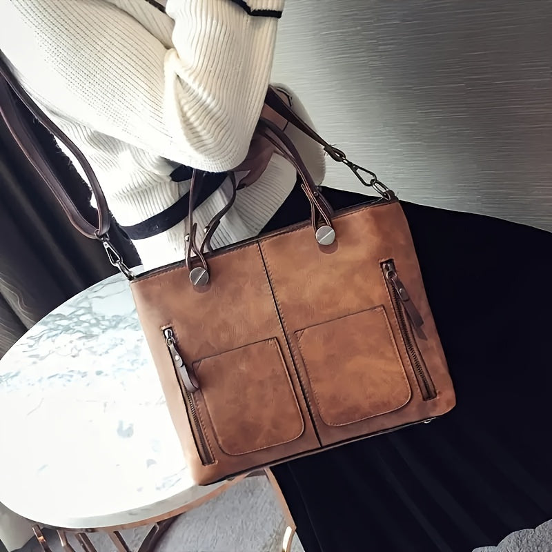 Ayollar uchun kulrang va och jigarrang rangdagi keng vintage uslubidagi xochli sumka, retro dizayni, zipper yopilishi, chetni moylash tugatishi bilan, kundalik foydalanish uchun ideal.