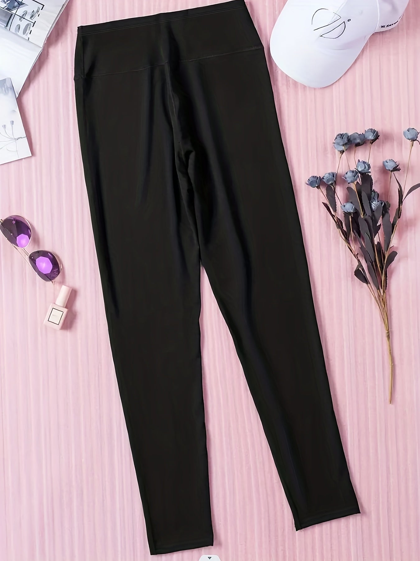 Leggings de talla grande para mujer negras de cintura alta con detalle de orificio