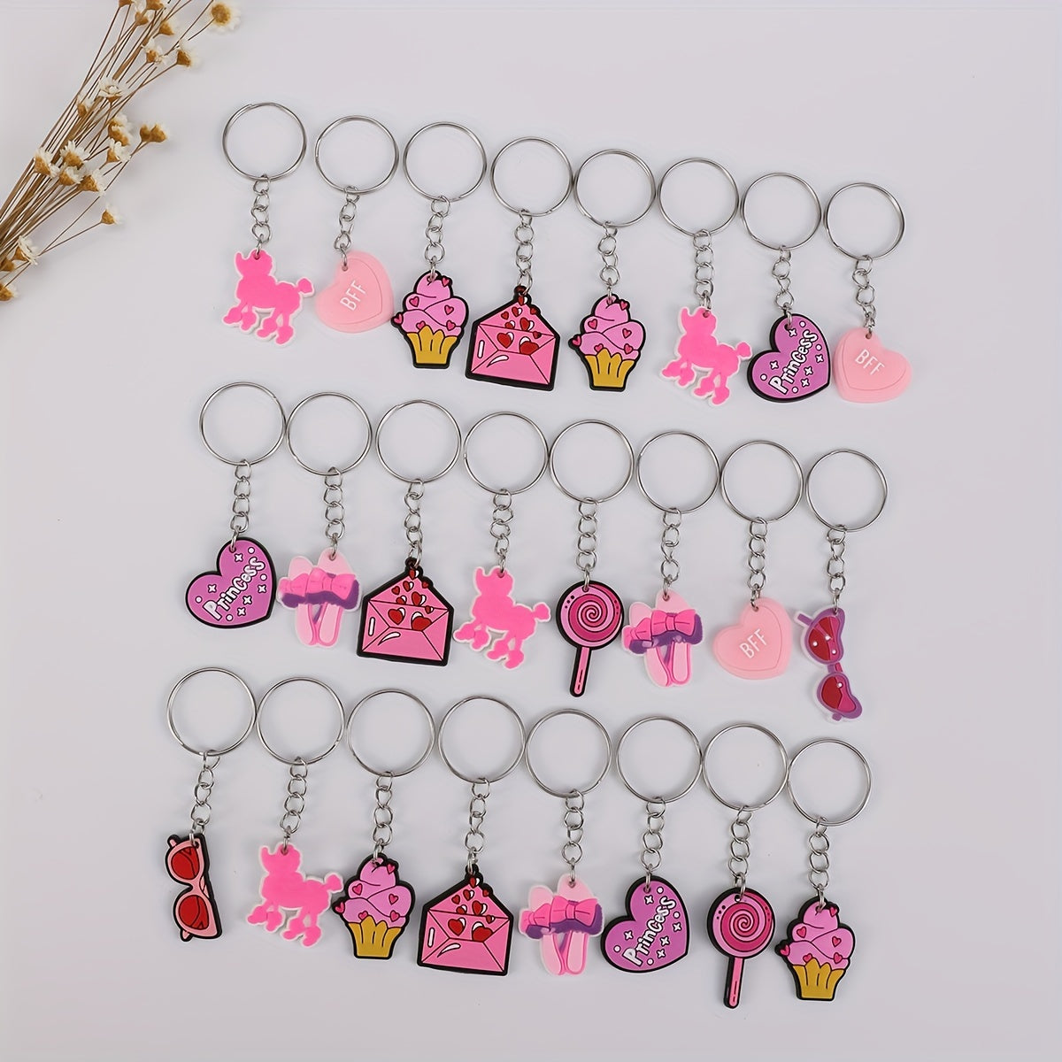 Set de llavero de PVC rosa con charms de dibujos animados, corazones, poodles, helados y piruletas para damas y niñas
