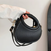Black Crossbody Bag with Embossed Stripe Pattern and Gold Hardware for Women