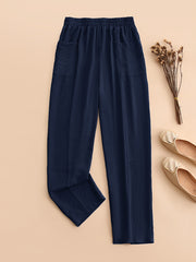 Yoz va bahor uchun ayollar uchun plussiz o'lchamdagi cho'ntakli, elastik belga ega bir rangli plussiz shimlar.