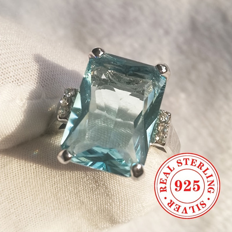 Sterling Silver Ring with Synthetic Aquamarine March Birthstone 4-Prong Setting