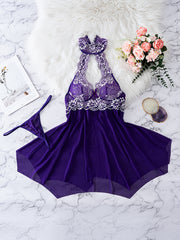 Ayollar uchun poliester va elastan aralashmasidan tayyorlangan nafis dantel halter top tunika va ichki kiyim to'plami. Qattiq rang, bog'ich detali, ko'krak pad yoki kamar yo'q bo'lgan to'qilgan mato bilan ajralib turadi.