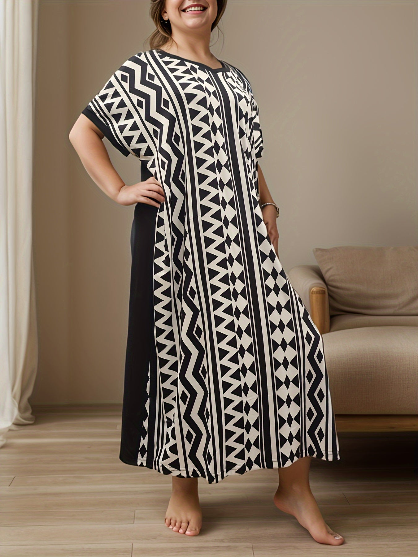 Plus Size Women's Black and White Geometric Batwing Sleeve Midi Dress