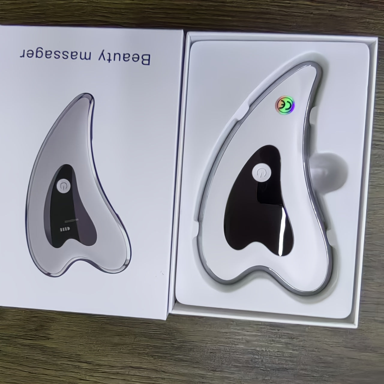 Masajeador facial eléctrico Gua Sha con calor, vibración y modo múltiple, recargable