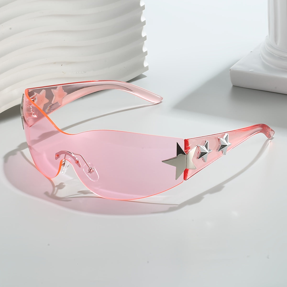 Gafas de moda unisex de gran tamaño con diseño futurista sin marco y decoraciones de estrellas