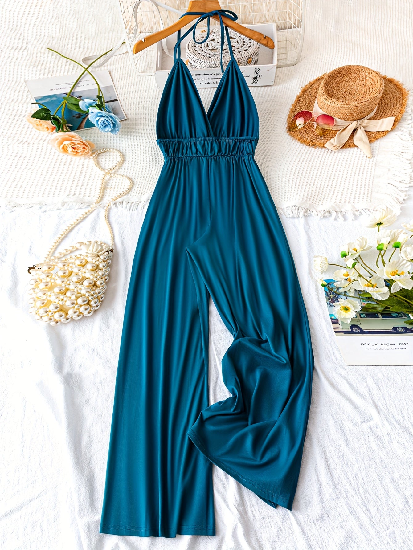 Women's Sleeveless V-Neck Jumpsuit Black Backless Flowy Legs Vacation Wear