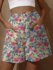 Pantalones cortos casuales florales con cinturilla fruncida para mujer talla plus con bolsillos de parche