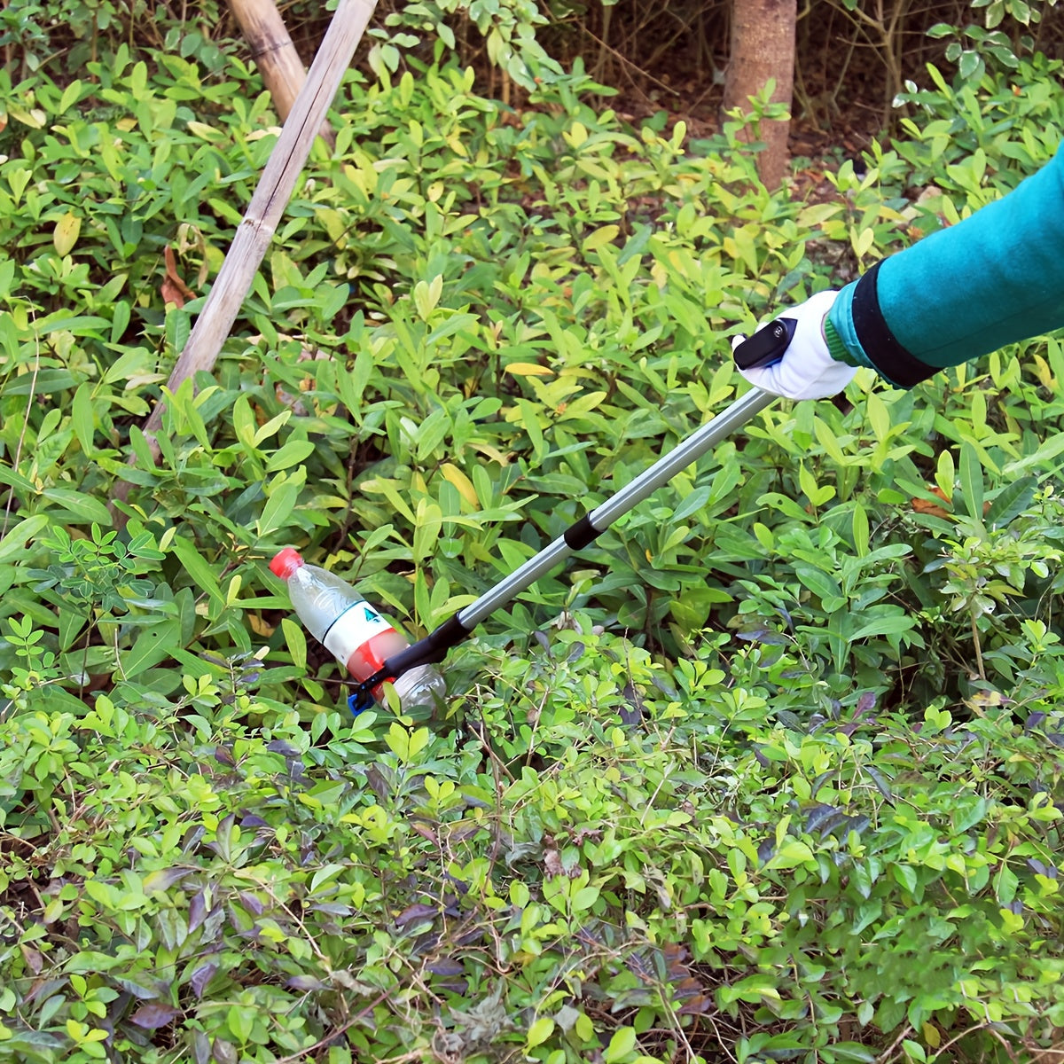 Qayriladigan zanglamas po'latdan yasalgan tutqich, 81.28 sm uzunlikda, axlatni olish uchun qalam, chiqindilarni yig'ish vositasi va qo'lni uzaytiruvchi tutqich, yetkazish vositasi