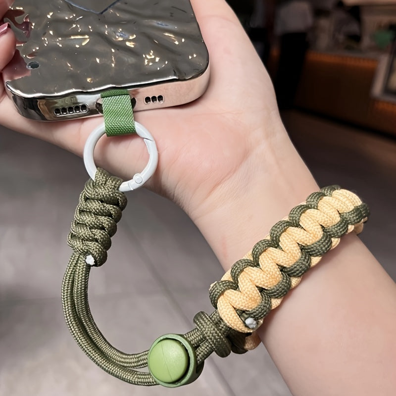 Qo'l bilan to'qilgan mobil telefon lanyard, sozlanadigan bilak tasmasi, o'g'irlikka qarshi tushirishni himoya qilish, jasur rang moslashuvi va kuchli metall qisqich. Kameralar uchun mos, universal moslik.