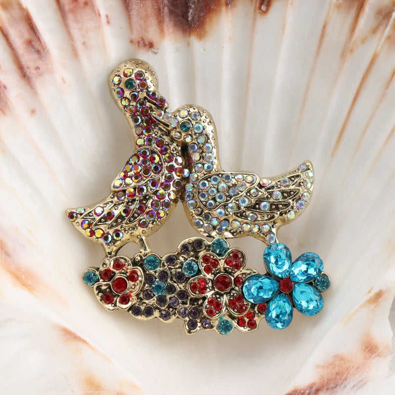Elegant Mandarin Duck Brooch Pin with Rhinestones and Floral Accents Jewelry