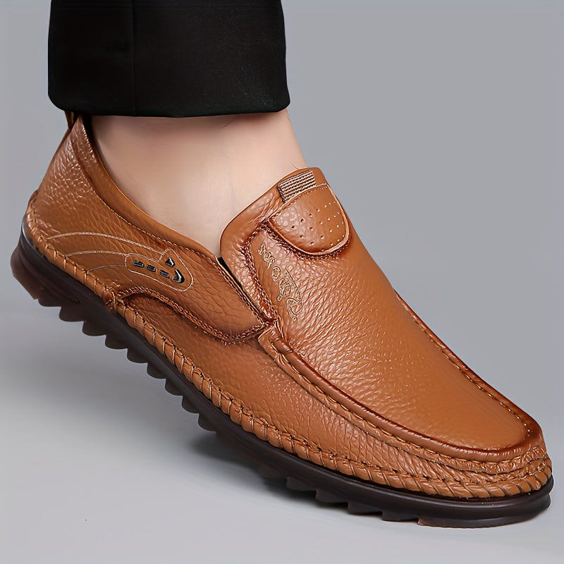 Erkaklar uchun yuqori donali sigir terisidan tayyorlangan, sirpanmaydigan kauchuk taglikka ega slip-on loafer poyabzallari.