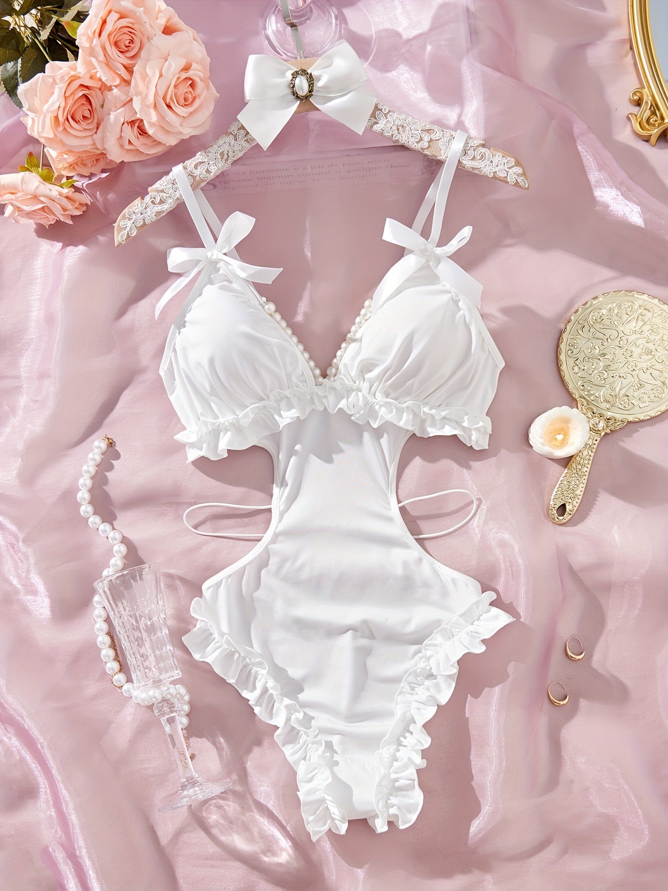 Сексуальный боди без спинки с глубоким V-образным вырезом и бантовыми плечевыми ремнями, милый дизайн.