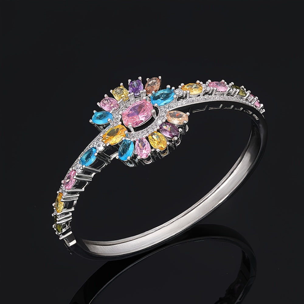 Zarif kelin zargarlik to'plami, kubik zirkoni bilan - to'ylar va maxsus tadbirlar uchun marjon, bilaguzuk, uzuk va sirg'alar o'z ichiga oladi.