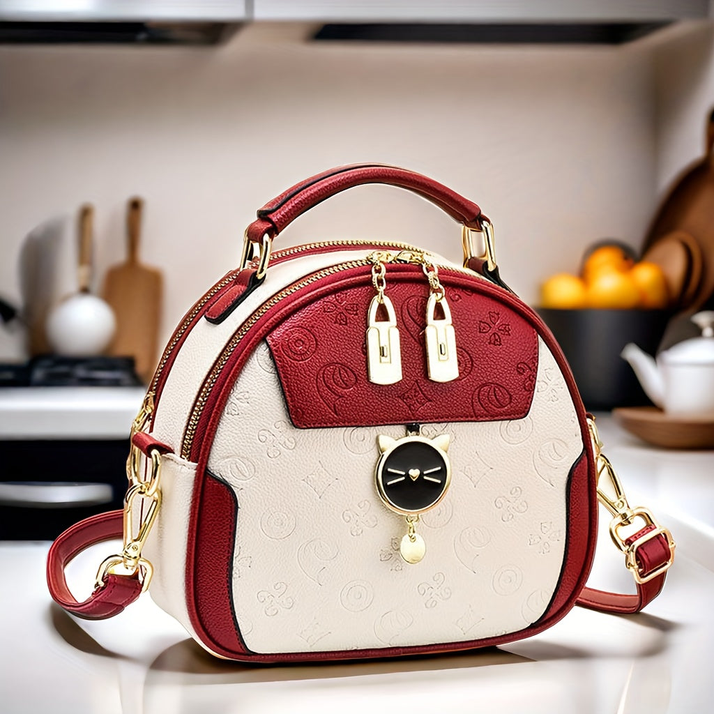 Bolso cruzado redondo negro para mujer con correa ajustable y cierre de cremallera