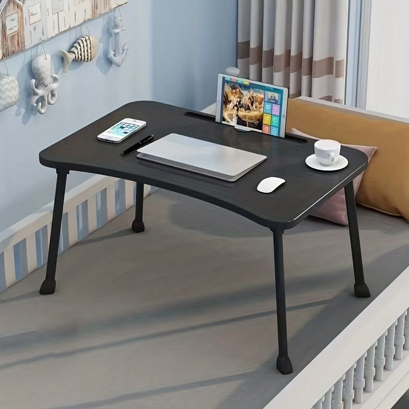 Portativ noutbuk stoli, uxlash stoli, nonushta qutisi, turuvchi stol, daftarchalar uchun ushlagich yoki yotoqda, divanda, kanapeda yoki polda foydalanish uchun o'rnatilgan. Quvvatli shisha ushlagichi mavjud va oson saqlash uchun yig'iladigan.