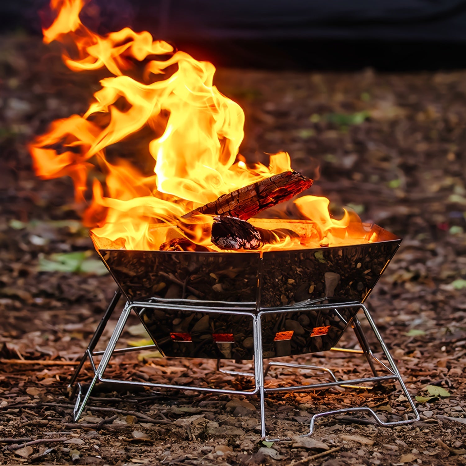 Портативный гриль из нержавеющей стали для барбекю, кемпинга, пикников и приготовления на открытом воздухе. Складной шестиугольный дизайн с регулируемыми ножками и вентиляционными отверстиями.