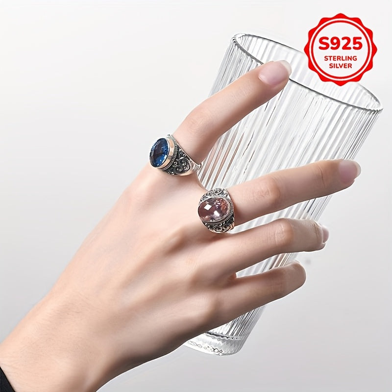 Vintage Style Sterling Silver Ring with Blue Zirconia and Carved Flower Design