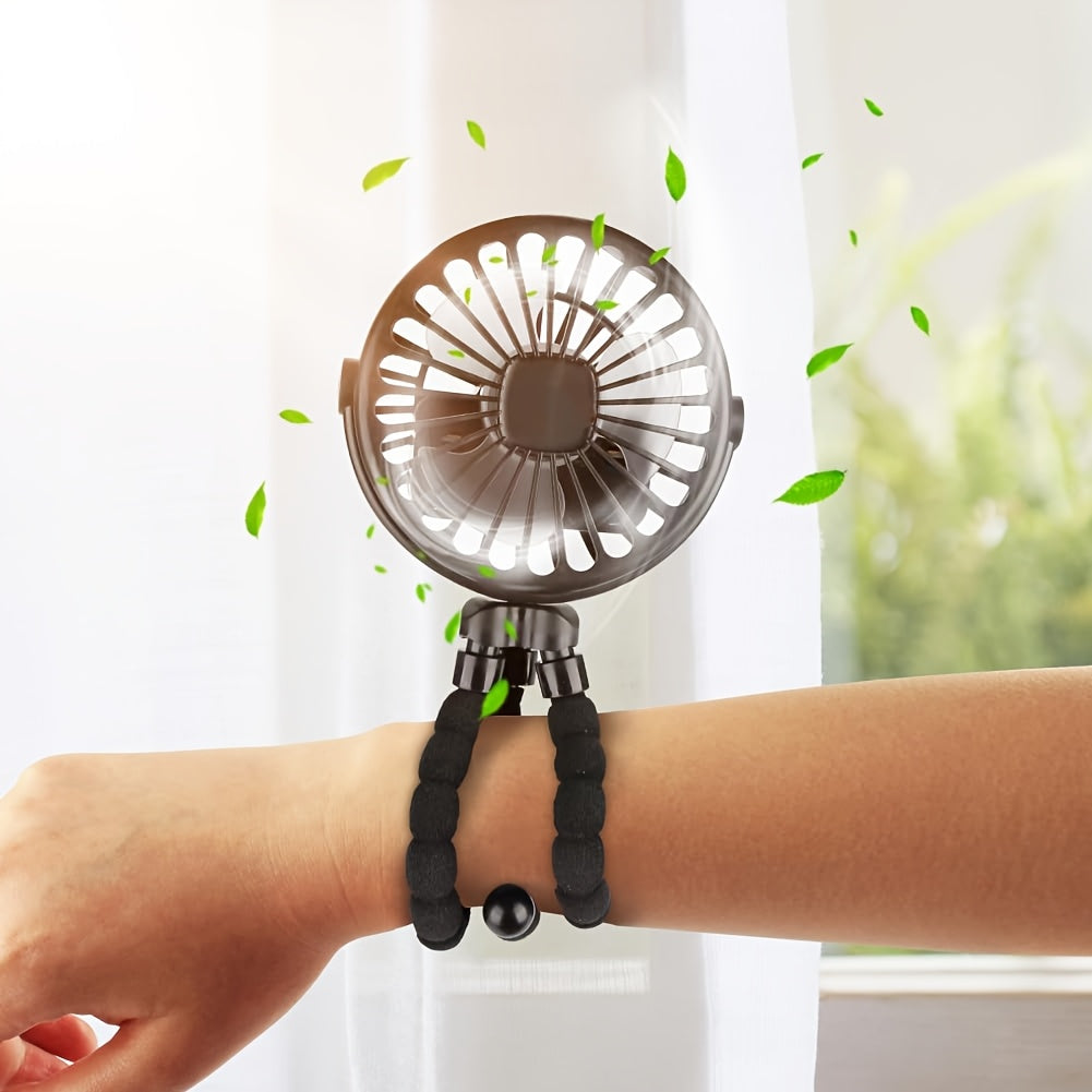 Ventilador mini portátil con soporte ajustable y correa para la muñeca, recargable por USB, ligero y compacto para cochecitos, actividades al aire libre y viajes