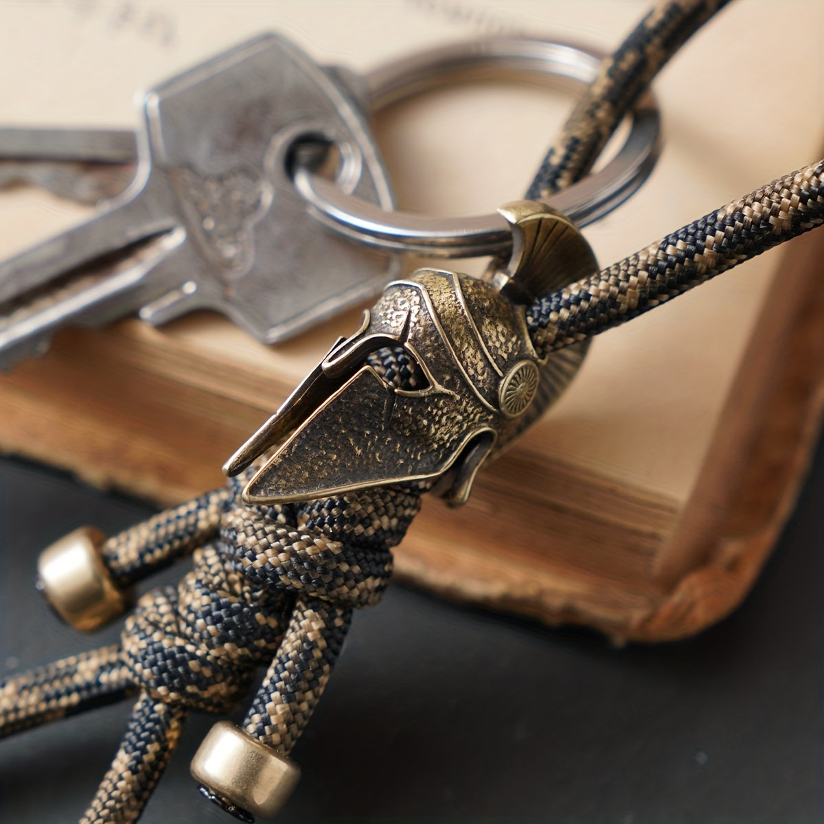 Brass Car Keychain with Metal Backpack Accent in Rich Brown