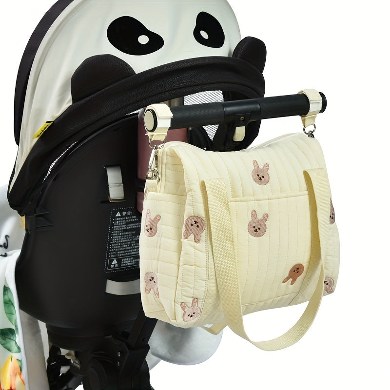 Spacious Embroidered Diaper Bag with Milk Bottle Organizer Multi-Functional Baby Stroller Hanging Bag
