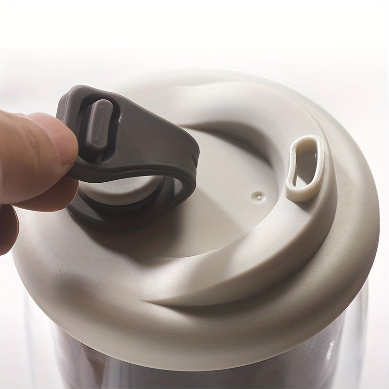 Izolyatsiyalangan espresso stakani, ikki qatlamli shaffof shisha, silikon qopqoq, qulay ushlash va ichish uchun tuxum shaklidagi dizayn. Qahva, sharbat va sut uchun ideal.