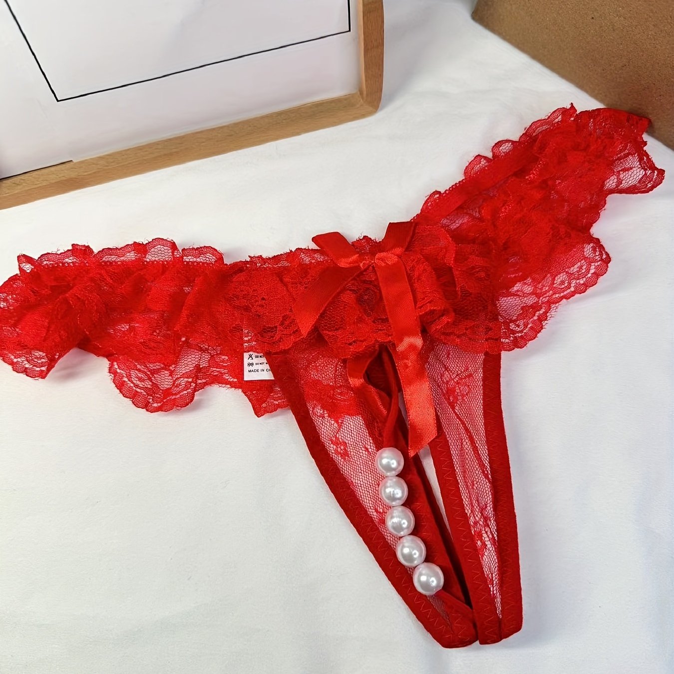 Women's Transparent Lace Crotchless Thong with Pearl Massage Details