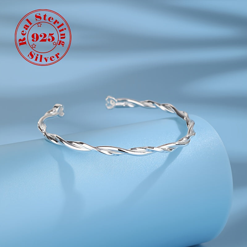Women's Silver Twisted Möbius Band Bracelet with White Gold Plating and Zirconia